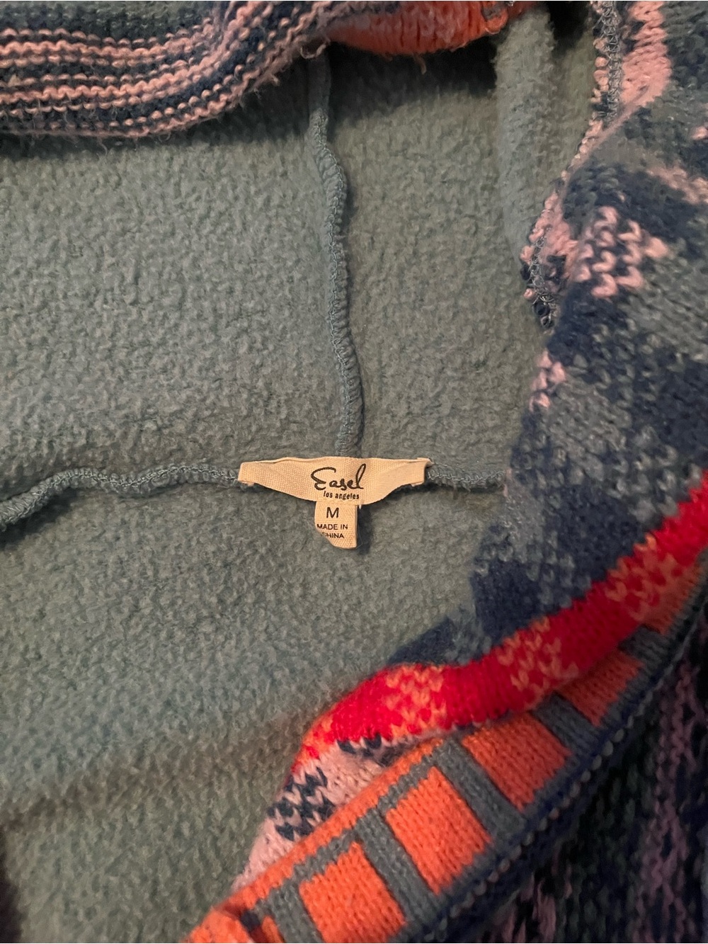 Easel Woman’s Hooded Pullover Sweater in light blue with Multicolor Trim - Picture 2 of 2